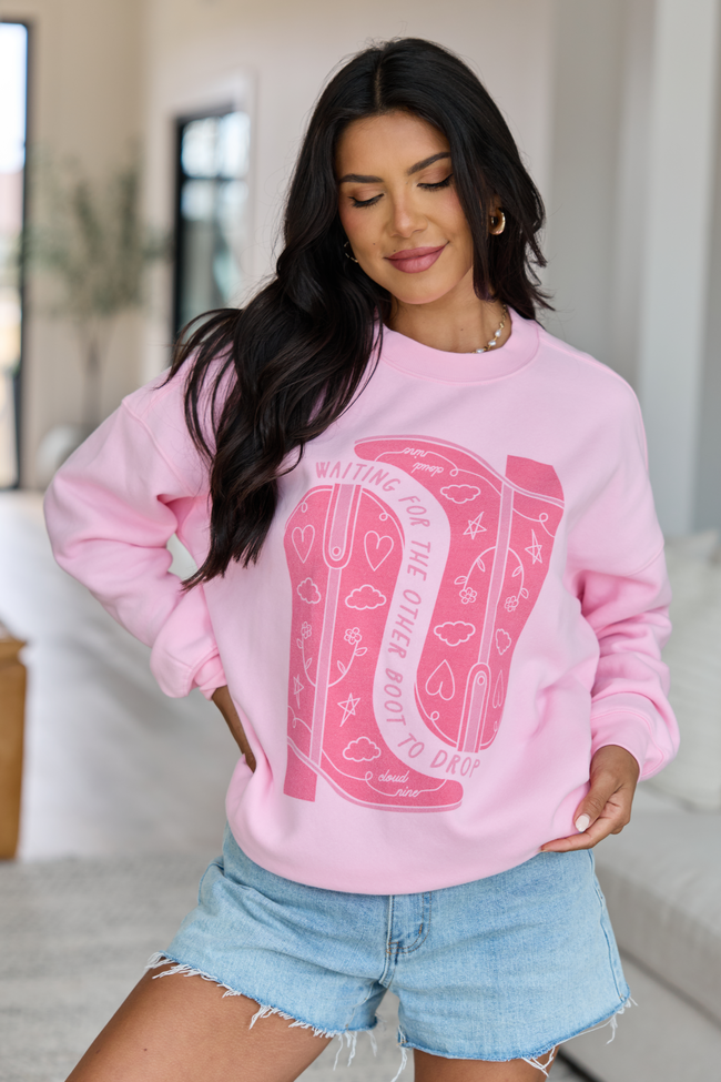 Waiting For The Other Boot To Drop Light Pink Graphic Sweatshirt - STB Boutique