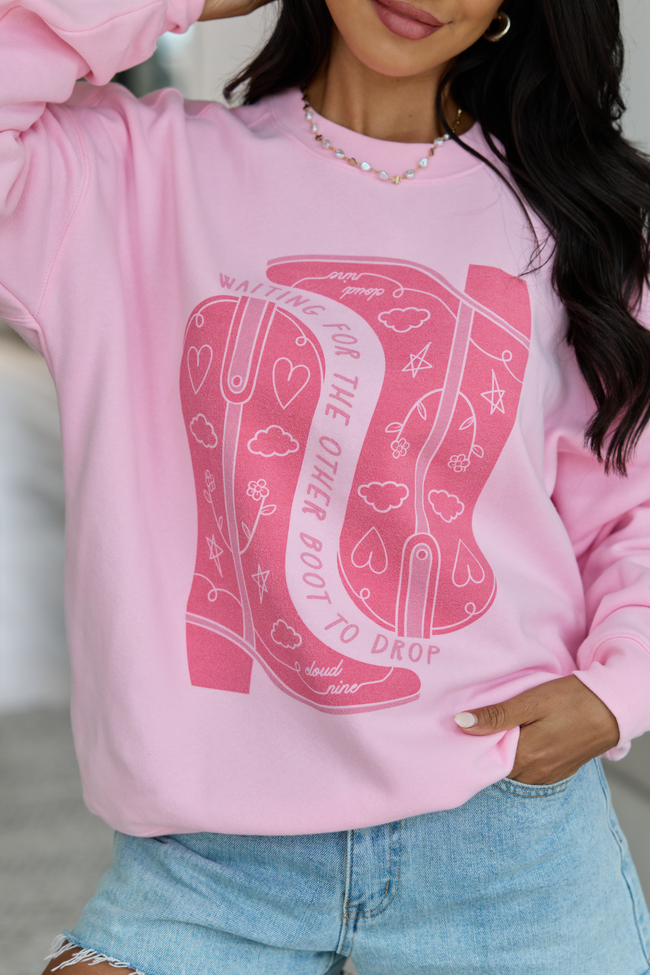 Waiting For The Other Boot To Drop Light Pink Graphic Sweatshirt - STB Boutique
