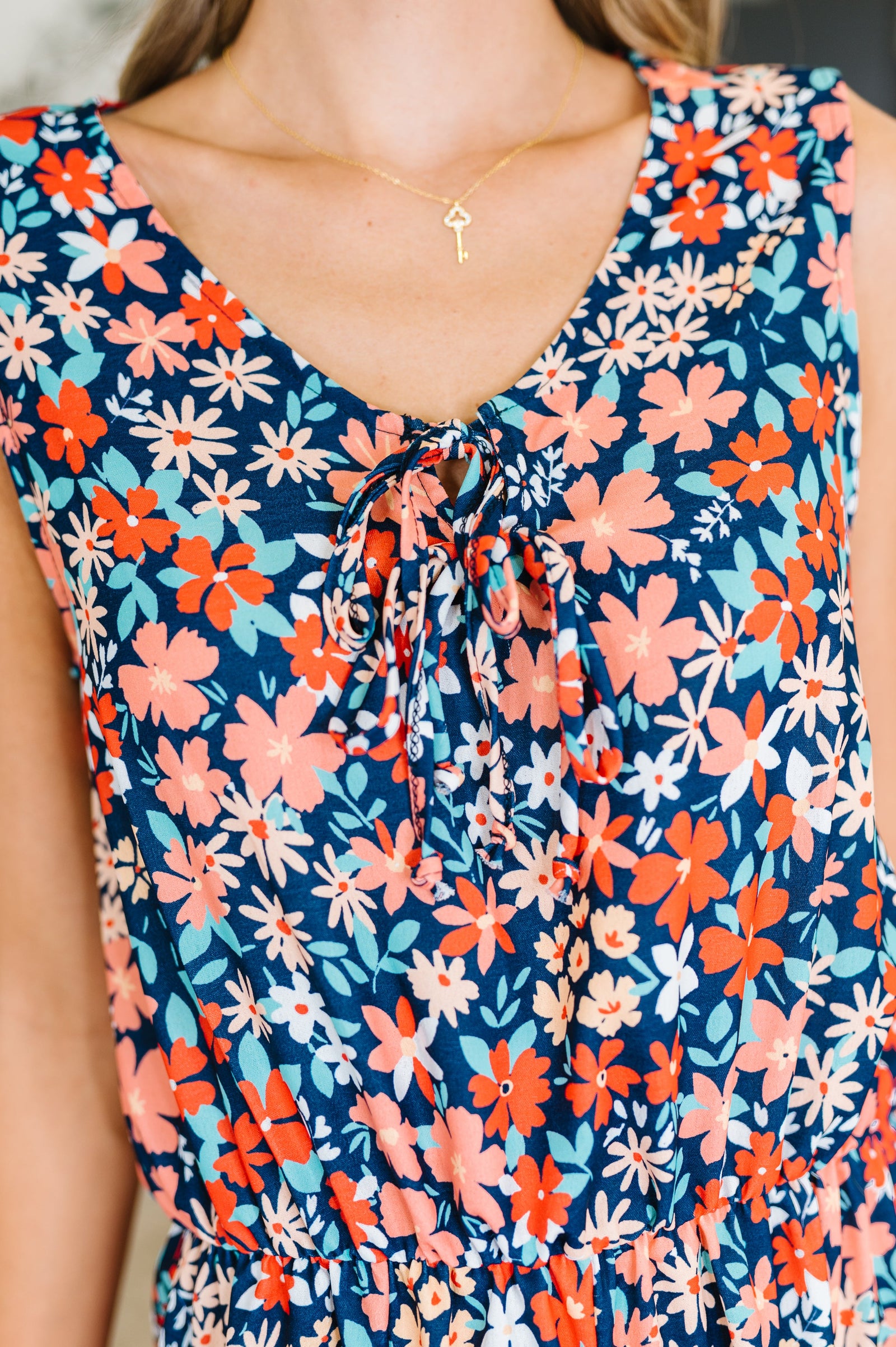 Meadow Mischief Sleeveless Romper in Navy/Orange/Teal (SM-2X)